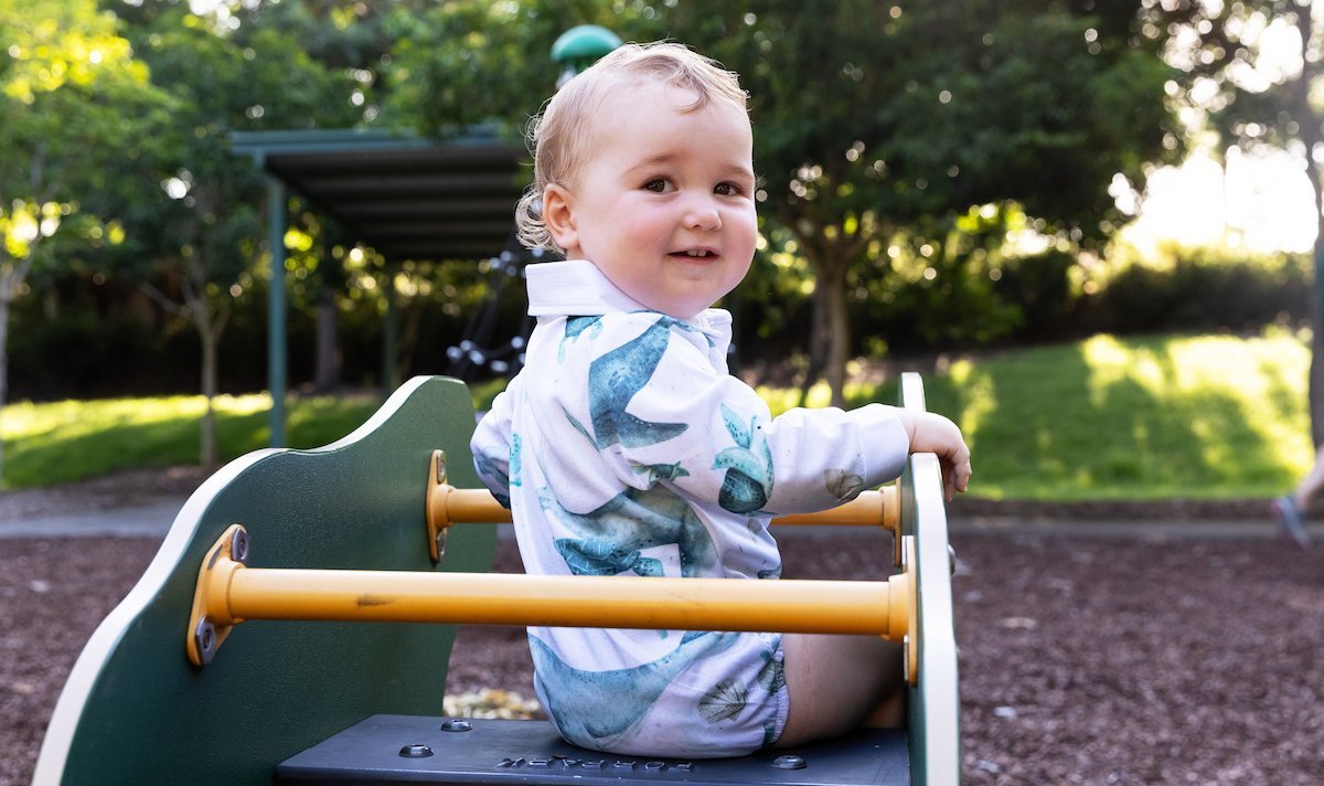 Adelaide wearing Fishing shirt Onesie