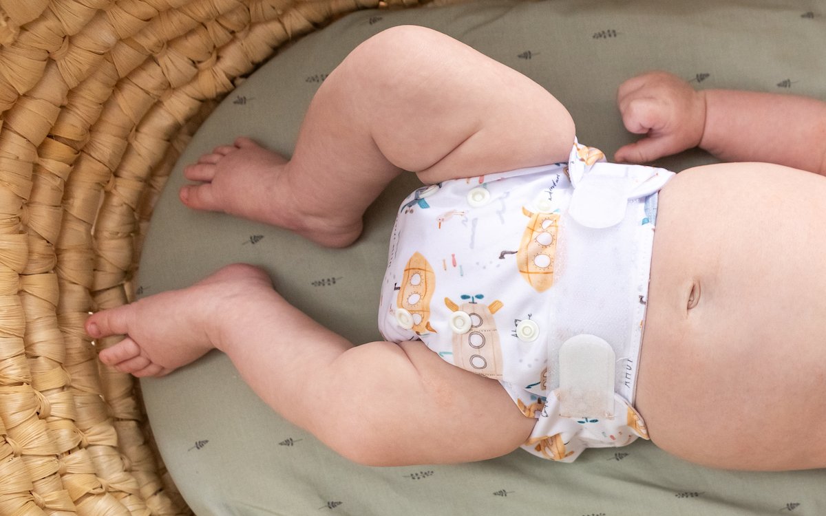 Picture of baby Roger wearing a submarine newborn cloth nappies